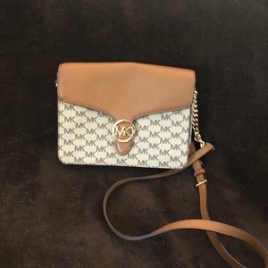 Michael kors tan with mk canvas.